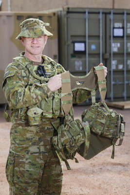 Australian Army officer Major Shane 'Buzz' Sarlin from Diggerworks with the 'Tiered Body-Armour System (TBAS) Tier 0 Heavy' harness (version 4.4) being trialled by soldiers from 6th Battalion, Royal Australian Regiment. Credit: Defence