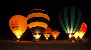 A balloon glow event, during which balloons are lit-up in time to music. (Belubula Ballooning)