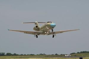 The first production model Cessna Citation M2 leaves the runway at Independence. (Cessna)