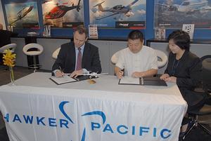 Hawker Pacific's John Oppenheim and Arena's Chunming Li at the acceptance ceremony. (Steve Hitchen)