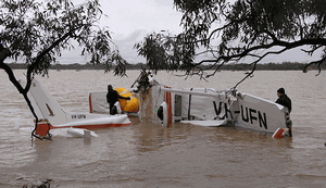 VH-UFN's cabin section of the fuselage/wing and tailplane sections in Woolcunda Lake. (ATSB)