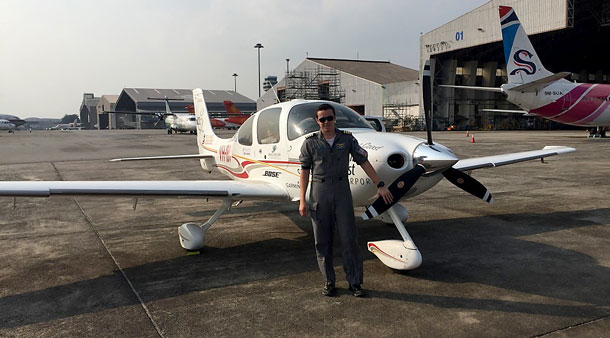 Lachie Smart with his SR22 during his leg through Asia. (Wings Around the World)