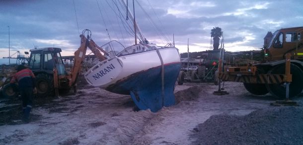 Slipping into the hole in the sand.