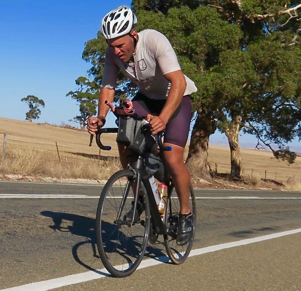 Totally focussed and averaging close to 500km per day, Abdullah Zeinab just north of Clare in the Clare Valley during the unofficial 2018 Indian Pacific Wheel Race. Image: Nat Bromhead