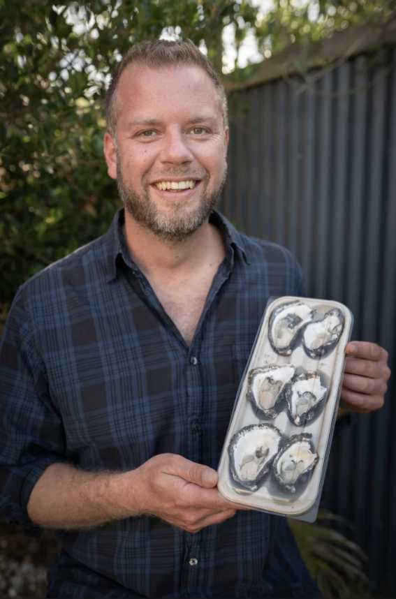 Sustainable steps forward: Blue Harvest managing director Scott Walter with the new oyster packagaing supplied by BioPak.