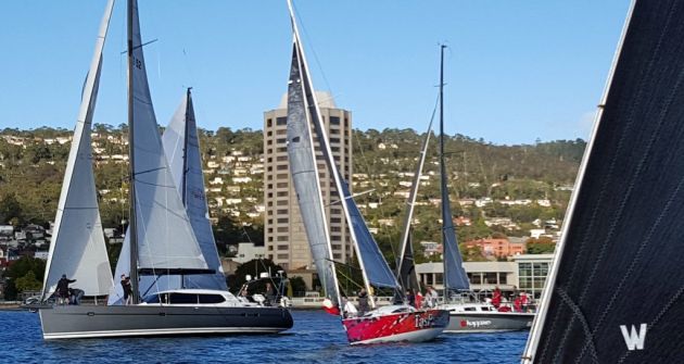 Infinity leads TasPaints and It Happens at the start of of the Wrest Point to Dennes Point pursuit race as a lead-up to the Barnes Bay Regatta. Photo by Michelle Denney.