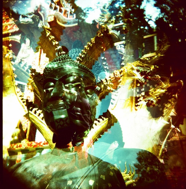 A statue outside a rural northern Thai temple, captured around 16 years ago. This is a fascinating place, but to give it a different and more engaging feel I walked around this Buddha statue and shot it from numerous angles.