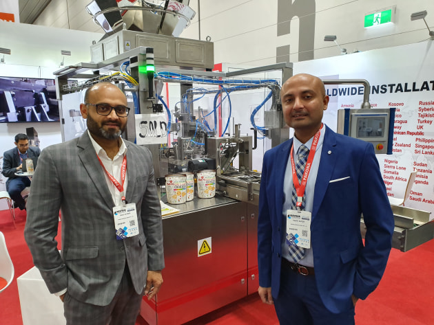 SOLD: Rahul Kotari and Rajeev Kapoor of India's Pakona Engineers sold this preformed pouch machine to New Zealand's Walter and Wild before the show.