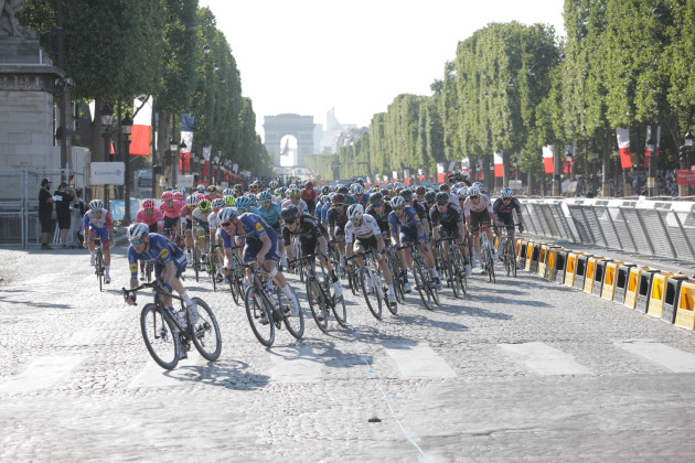 Deceuninck Quickstep riders were working to set Mark Cavendish up for the sprint in the final lap of the Champs Élysées. But a late attack by Bora Hansgrohe then rocket-fast sprint by Wout van Aert changed history. Image: Sirotti.