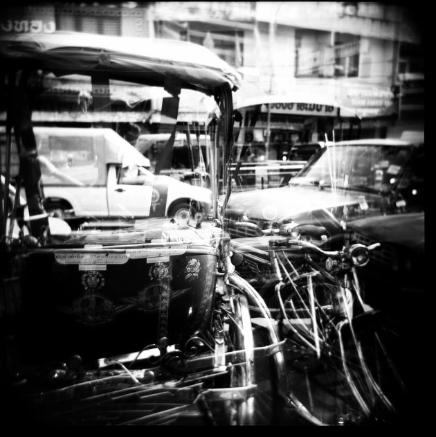 Northern Thailand, around 17 years ago and captured on my original red Holga with 120mm film. The idea was to use multiple exposures to show the contrasts between the old and new methods of transport in one single image.