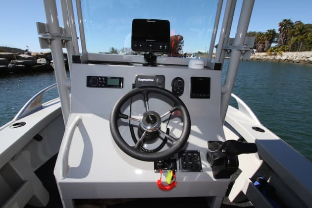 The roomy console folds down to fit into garages and low carports.