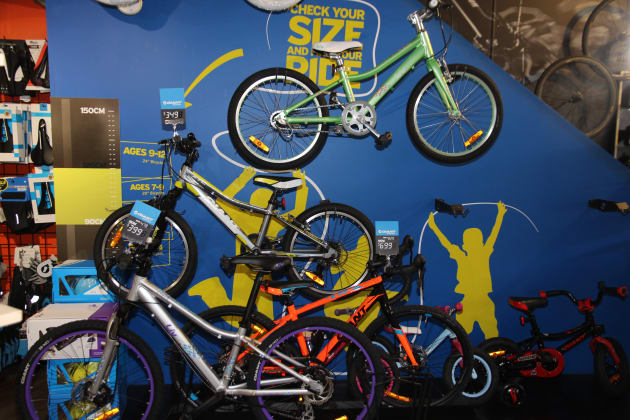 Strong graphics and a nice height chart turn this corner next to the stairs into an enticing kid&rsquo;s section.