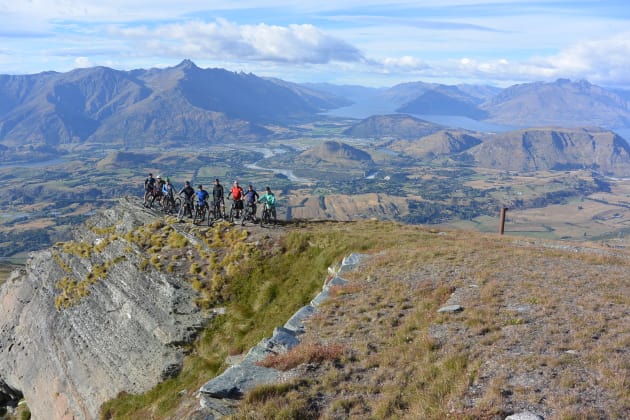 Only 1,100 metres of vertical descent to go—our crew at the top of Coronet Peak.