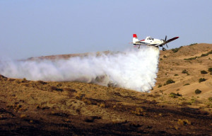 An M-18 Dromader on a practise water drop run. (Hustvedt)