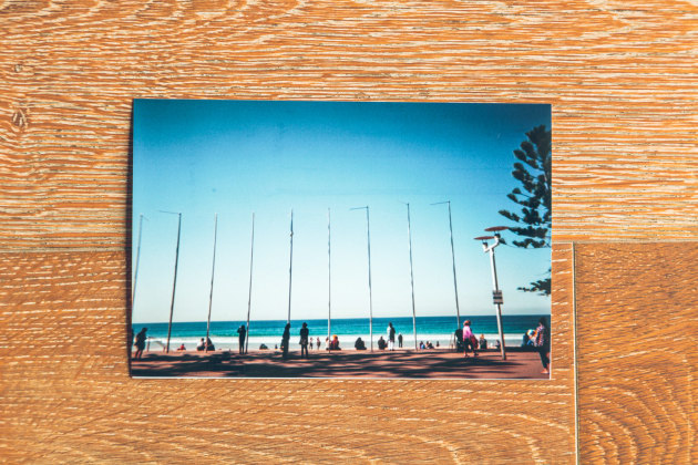 Manly - A gorgeous day on a popular Sydney beach. I guess I thought this image with the poles would look better. At least my finger isn’t in the shot.