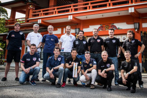 Pilots pose for a photograph in front of Chiba Shrine prior to the second round of the 2015 Red Bull Air Race World Championship in Chiba, Japan. (Andreas Langreiter/Red Bull Content Pool)
