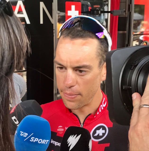 Richie Porte of BMC Racing Team speaks with reporters at the start of Stage 8 in Dole. Today's Stage 9 will be critical for Ritchie & the team's Tour. Image: Nat Bromhead.