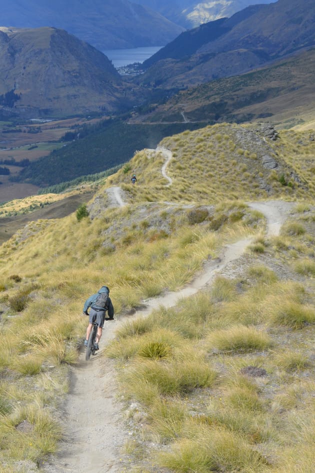 Winding down an exposed ridgeline, Rude Rock is an amazing trail—just watch out for the wind if you like to get your wheels off the ground.