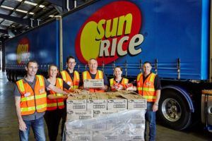 Volunteers with the rice donations.