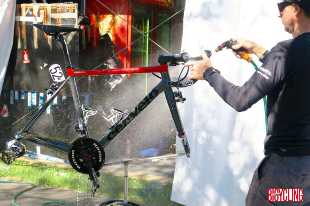 A team mechanic rinses off this Cervelo at the tour village after a day's racing. Image: Nat Bromhead