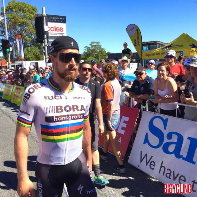 Two-time World Champion Peter Sagan walks to the McClaren Vale start line of the Willunga Hill stage of the tour. Image: Nat Bromhead