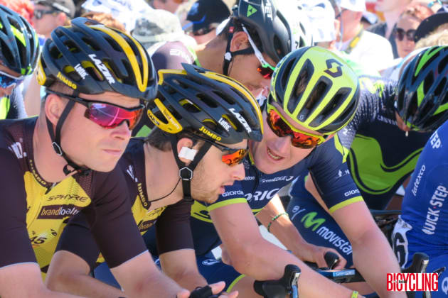 Orica-Scott's Luke Durbridge speaks with mates in the pro-peloton at a stage start. Image: Nat Bromhead.