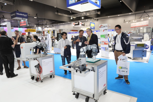 ABB's Peter Bradbury engages with customers at the ABB stand, AUSPACK 2019.