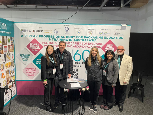 PKN's Sharon Amos (far left), on the AIP stand with (l to r) Mark Kelton, Nerida Kelton, Nis Ikhwan, and Ralph Moyle