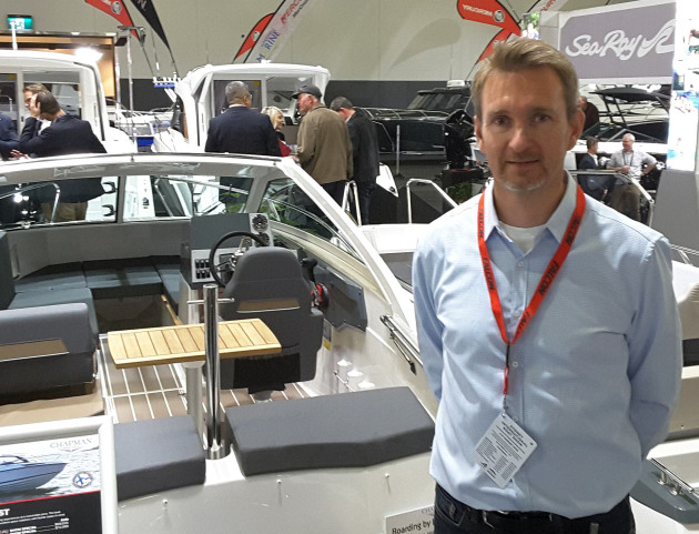 Ari Kuikka, Bella export sales director, with the new Flipper 600 ST at SIBS.