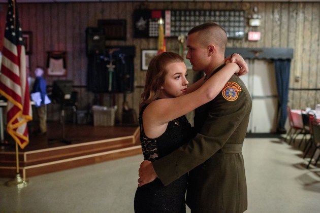 © Sarah Blesener. Garett, a senior member of the Young Marines, dances with his girlfriend at a Young Marines ball, 21 October 2017, Hanover, Pennsylvania. The Young Marines are a non-profit program in the United States that teach patriotic education, drug awareness education, and basic military introductions to students across the country.