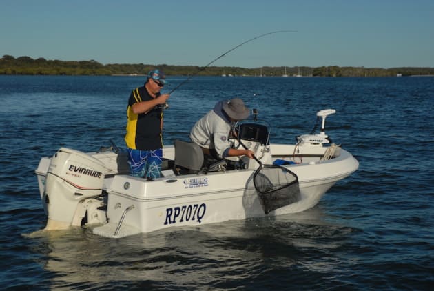 Netting a big flathead midship.