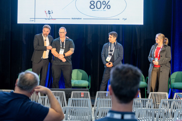 Henrik von Scheel brings audience members on stage to demonstrate how workflows drive value in digitalisation 2.0.