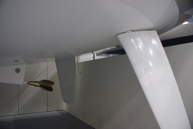 Note the wide flat aft sections with the angled twin rudders.