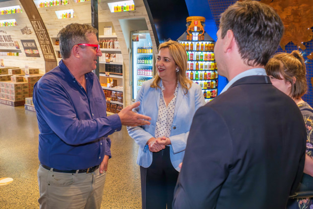 Bundaberg Brewed Drinks CEO John McLean, Queensland premier Annastacia Palaszczuk, and Member for Bundaberg Tom Smith (back to camera) at the launch of the 2023 Queensland Exporter of the Year Awards.