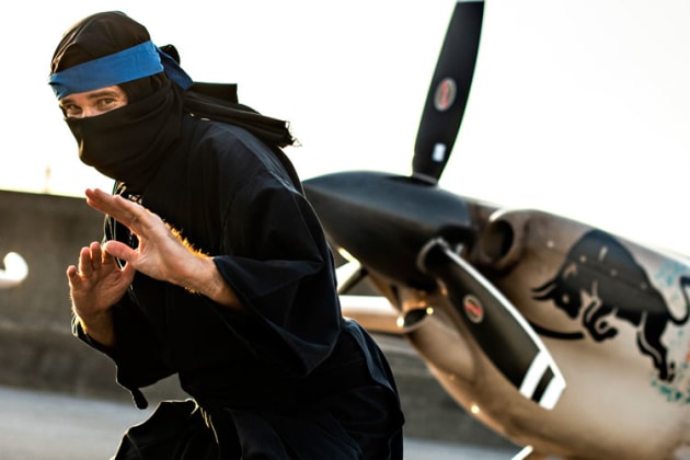 Coming to get you: Matt Hall poses in ninja gear ahead of this weekend's Red Bull Air Race in Chiba, Japan. (Mihai Stetcu / Red Bull Content Pool)