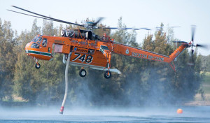 A fully loaded Erickson Aircrane is nearly 20 tonnes and 9000shp of firefighting helicopter, but it could all be undone by a four-kilogram drone.