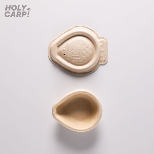 Holy Carp! is made from natural bagasse plant pulp. It's plastic free, home compostable, and designed to disappear.