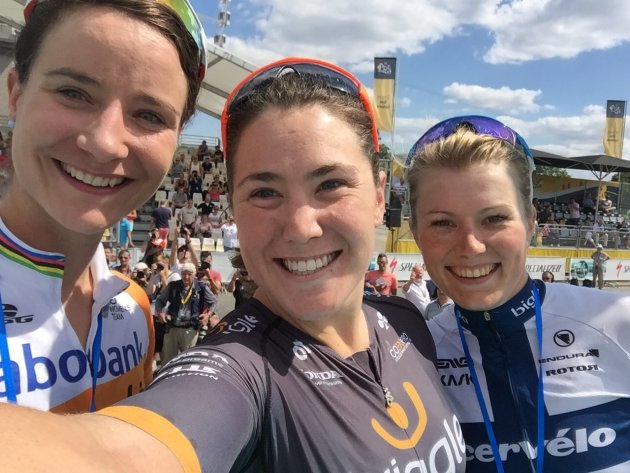 Chloe Hosking takes a podium selfie with Marianne Vos and Lotta Lepisto after winning La Course by le Tour de France.