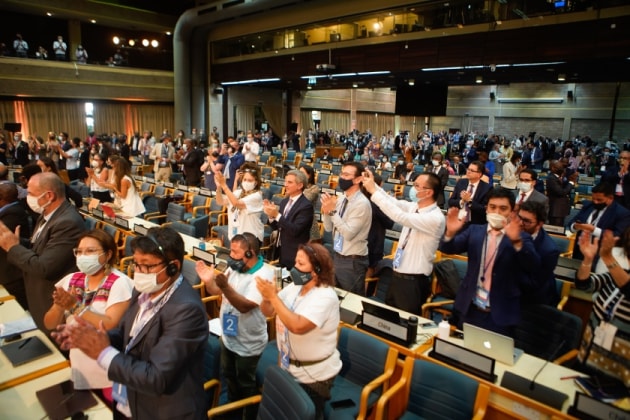 Delegates at the UN Environment Assembly embrace as a resolution is signed to begin negotiations for a global treaty to end plastic pollution is a major milestone for addressing the issue. (Image source: UNEP)