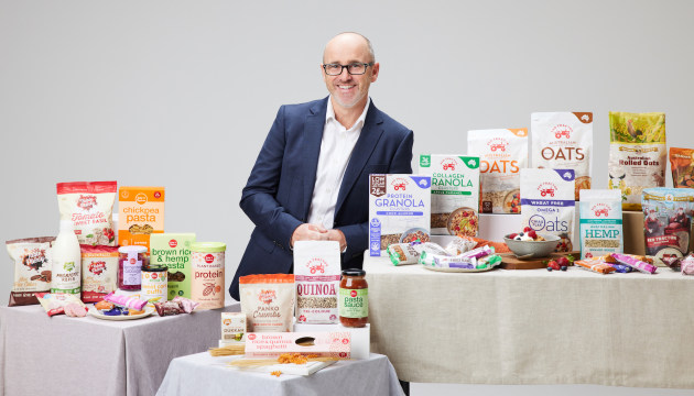 Openway Food Co. started with more than $100m in turnover and 150 SKUs by acquiring three companies with backing from Five V Capital. Pictured is CEO Andrew Loader with some of the products acquired. 
(Image supplied by Openway, Benny Capp)