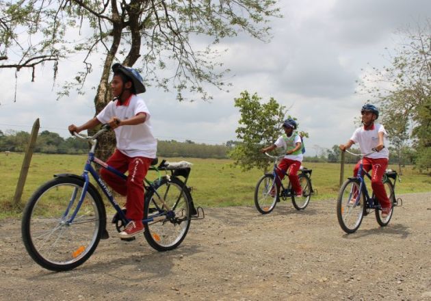 Bicycles let students get to school about four times faster than walking, even on rough dirt roads.