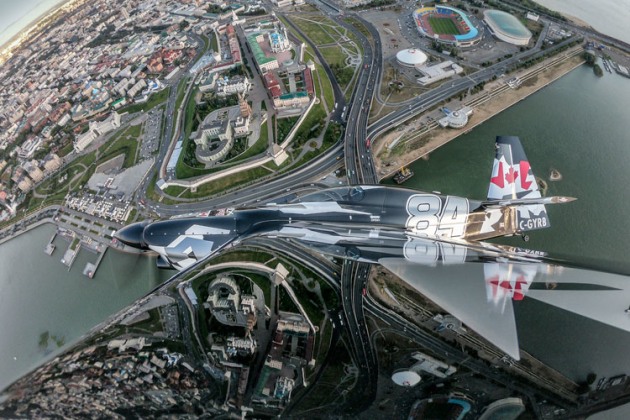 The city of Kazan in reflected in the wing of Canadian Pete McLeod's Edge 540 ahead of this weekend's Red Bull Air Race. (Pedrag Vuckovic / Red Bull Content Pool)