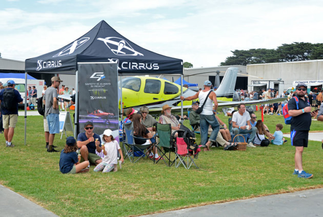 Cirrus offered stunning new-model SR22 for inspected and provided some shade on a warm day. Image Steve Hitchen