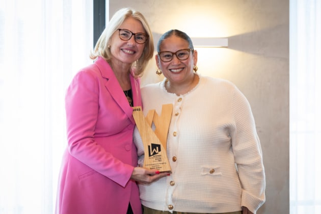 Lindy Hughson congratulates Zaidee Jackson of Ball & Doggett on her win in the Communications & Marketing Excellence category.