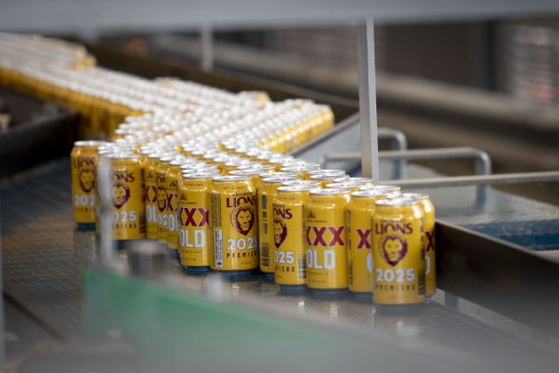 Limited edition Broncos XXXX cans roll off the line.