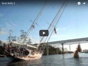 An oldie but a goodie - how to get a tall mast under a low bridge