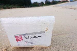 Coles packaging washes ashore after cargo incident 