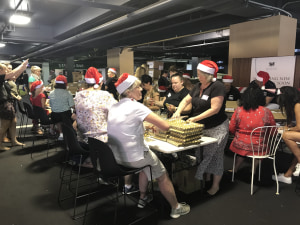 AIP hits $1m for Foodbank Hamper Packing Day
