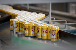 XXXX cans celebrate Qld's triple sporting triumph 