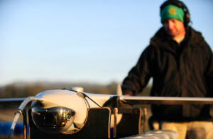 Insitu Pacific field service representative Bruce Leeder prepares a ScanEagle unmanned aerial vehicle for its early morning mission to support soldiers during Exercise Talisman Sabre 2011. [Photo:Defence]